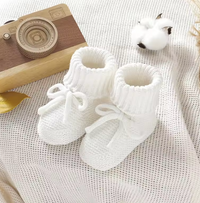 Thumbnail for SnuggleSteps – Chaudes et douces – Chaussons tricotés pour bébés