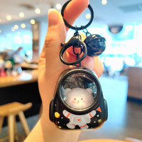 Thumbnail for Glowing Astronaut Charm – Mignon et lumineux – Pendentif sac « Astronaute »