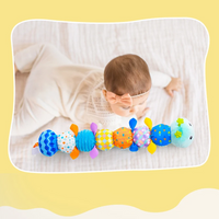 Thumbnail for CuddleCater – Stimulation sensorielle et développement – Hochet pour bébé