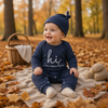 CuddleBaby – Bonjour, je suis nouvelle ici – Ensemble combi-pantalon et bonnet pour bébé
