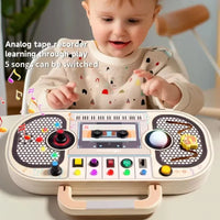Thumbnail for Wooden Busy Board – Motricité et interactivité – Tableau d'activités musicales