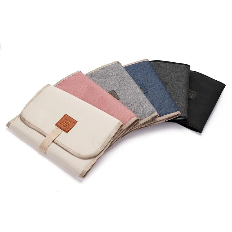 SnugPad – Confort et commodité – Tapis à langer